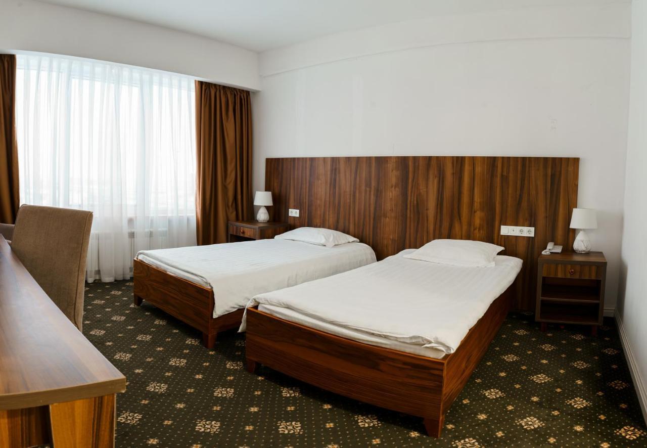 Hotel The Square à Astana Extérieur photo